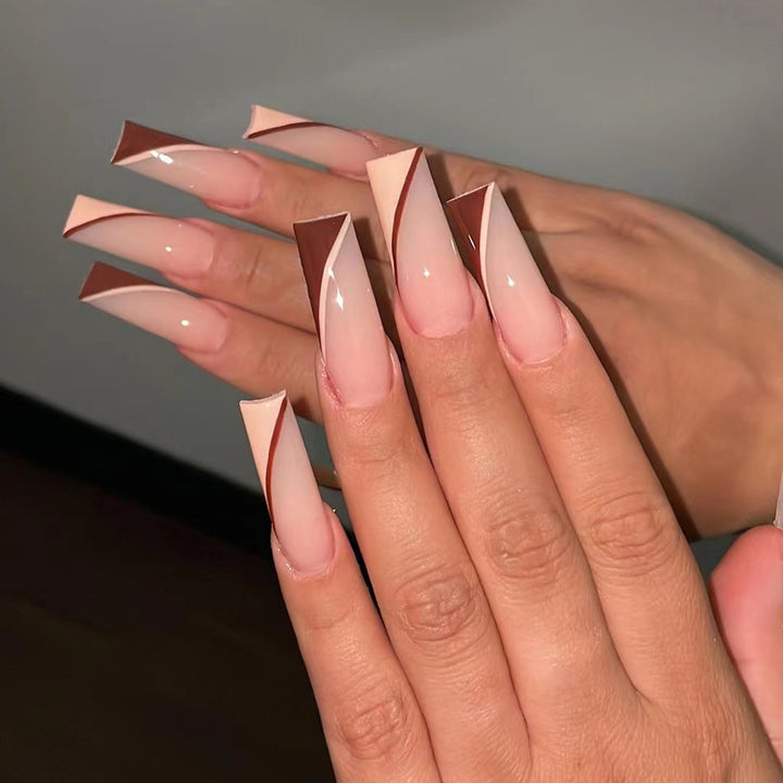 Artful stiletto nails with elegant gradient and geometric accents Kalsten