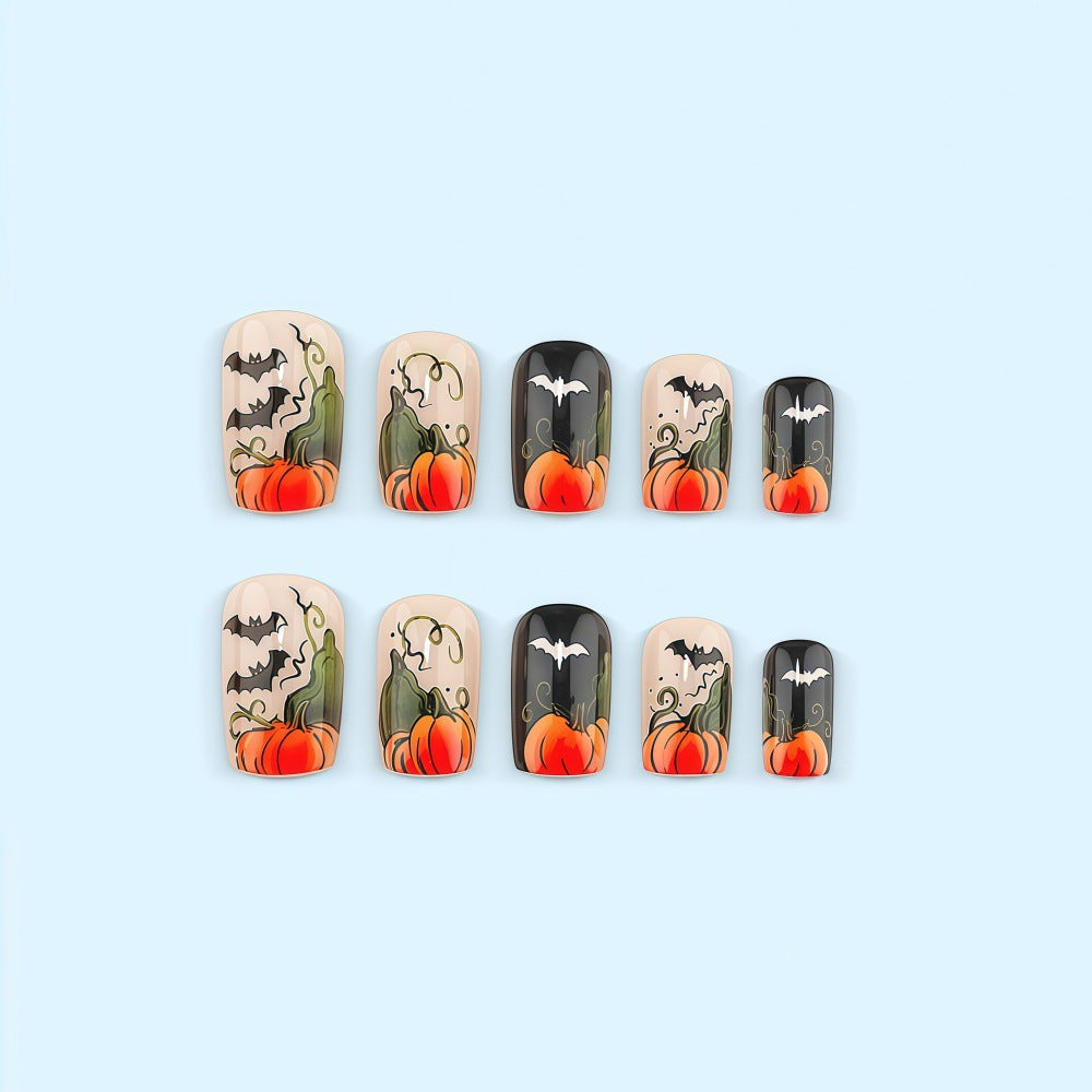 Artificial nails in Halloween design with pumpkins and ghosts Kalsten