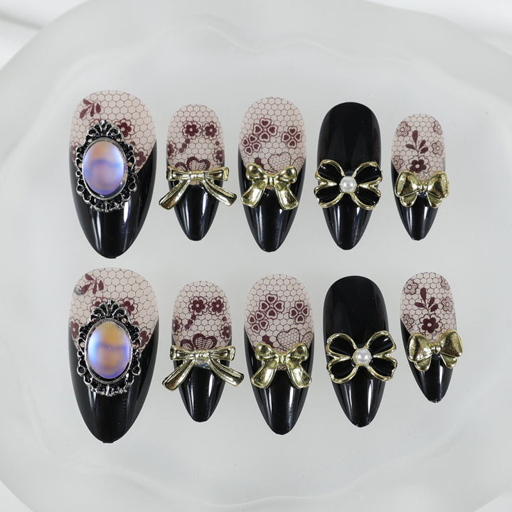 Artificial nail set with elegant dot and bow decorations Kalsten