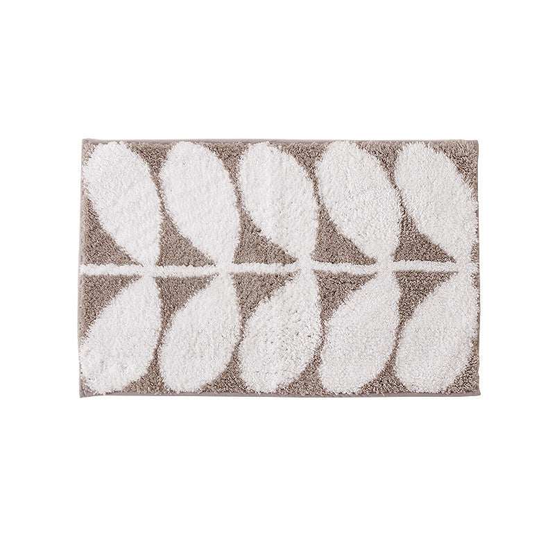Fluffy bath mat in a graphic wave relief with anti-slip base Kalsten