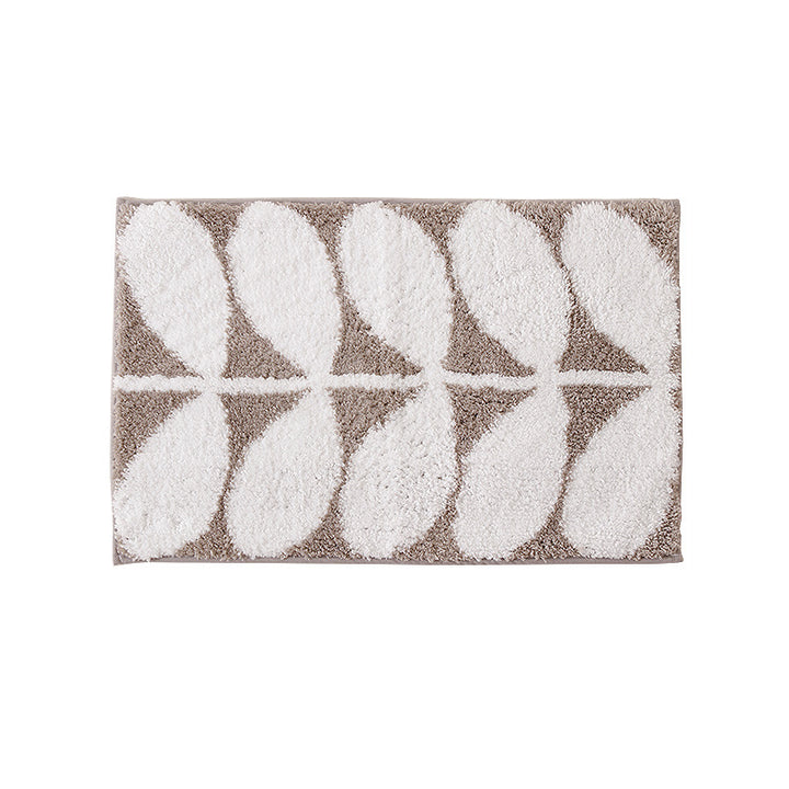 Fluffy bath mat in a graphic wave relief with anti-slip base Kalsten