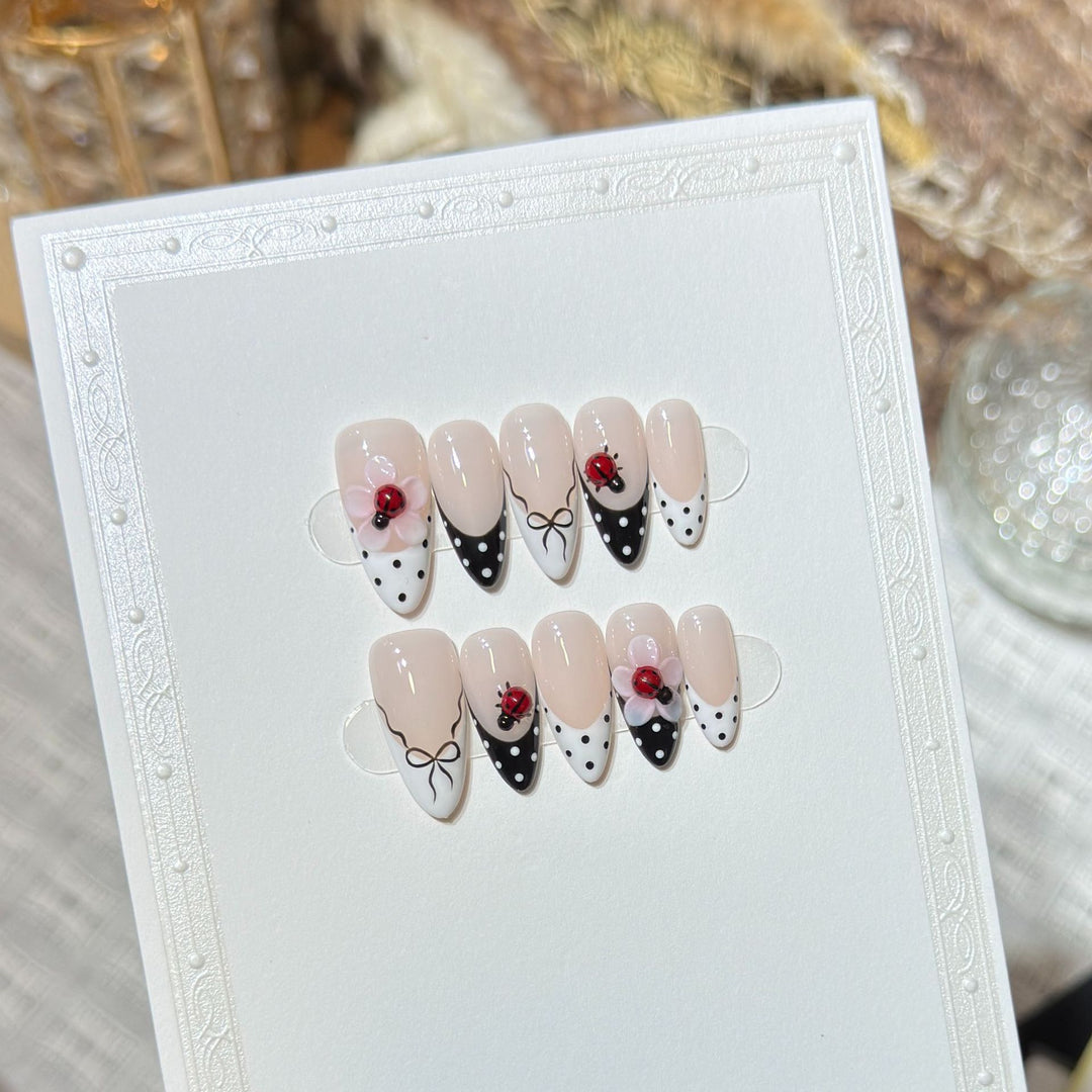 Artistic Stiletto Press-On Nail Set with Floral and Insect Designs Kalsten