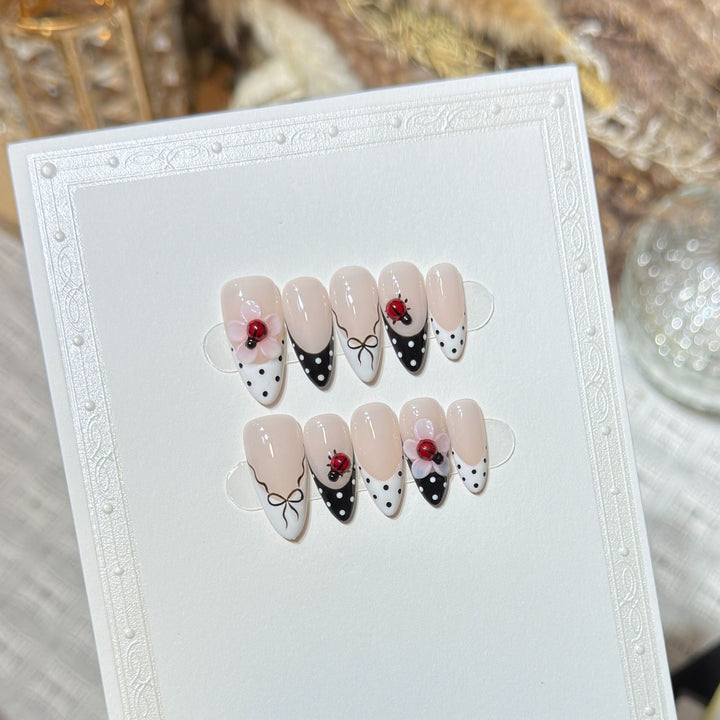 Artistic Stiletto Press-On Nail Set with Floral and Insect Designs Kalsten