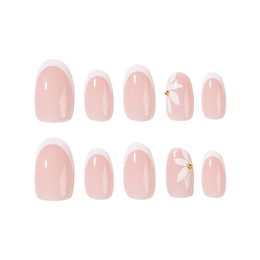 Artful French nails with delicate flowers and glitter accents Kalsten