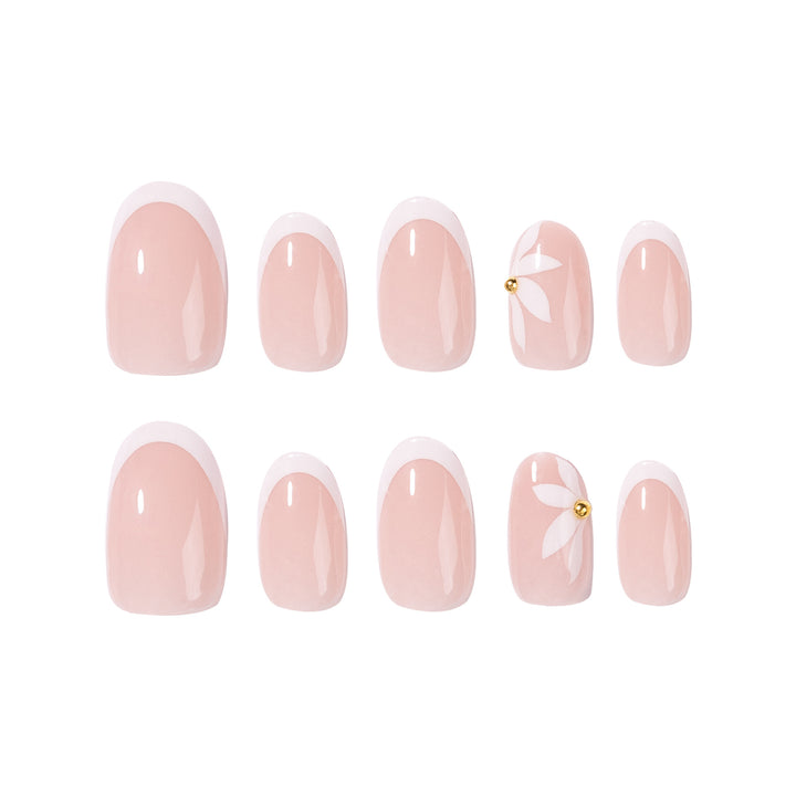 Artful French nails with delicate flowers and glitter accents Kalsten