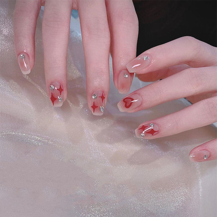 Acrylic nail set with sparkling rhinestone embellishments Kalsten