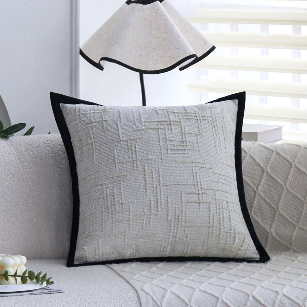 Square decorative cushion cover with structured grid tufting and contrasting piping Kalsten