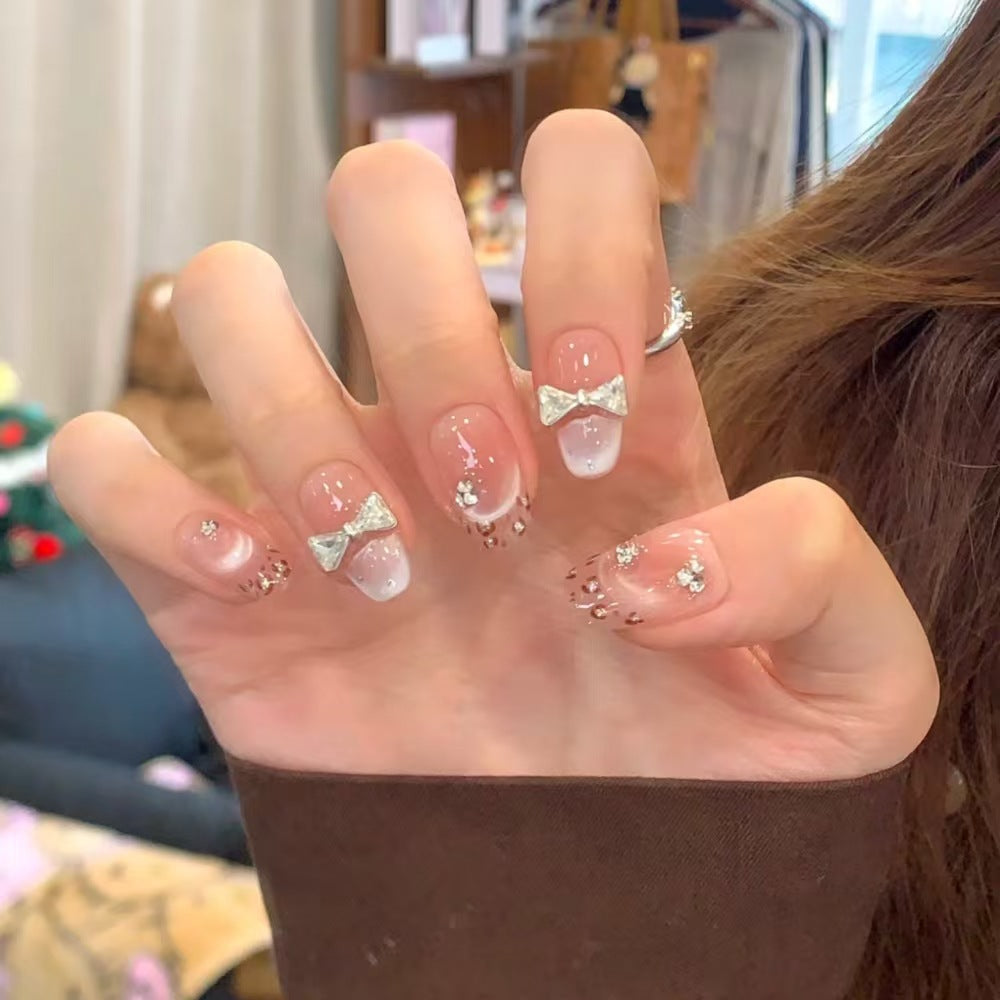 Artistic Press-On Nail Set with Unique Bow and Heart Accents Kalsten