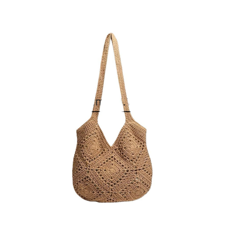 Handbag made of braided natural material with tassel details Kalsten