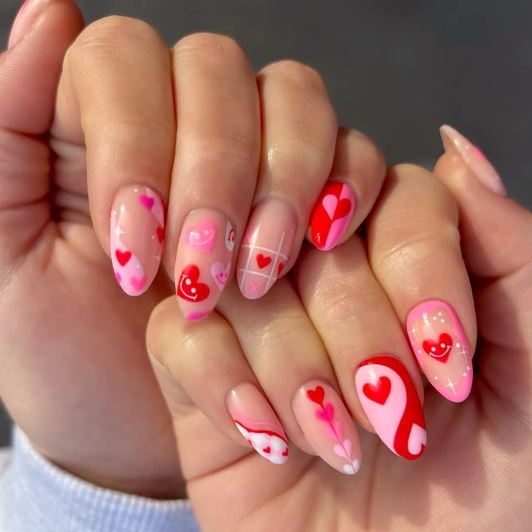 Acrylic nail set with romantic heart motifs and modern designs Kalsten