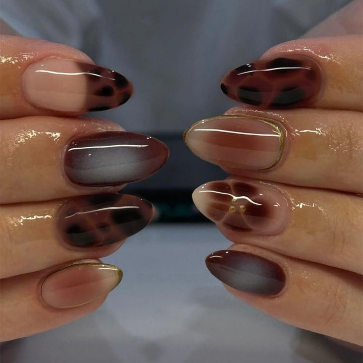 Glamorous acrylic stiletto nails with elegant glitter design Kalsten