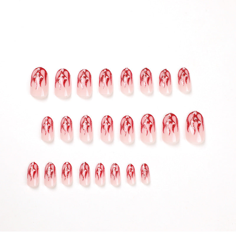 Artificial nail art with romantic heart and flame design Kalsten