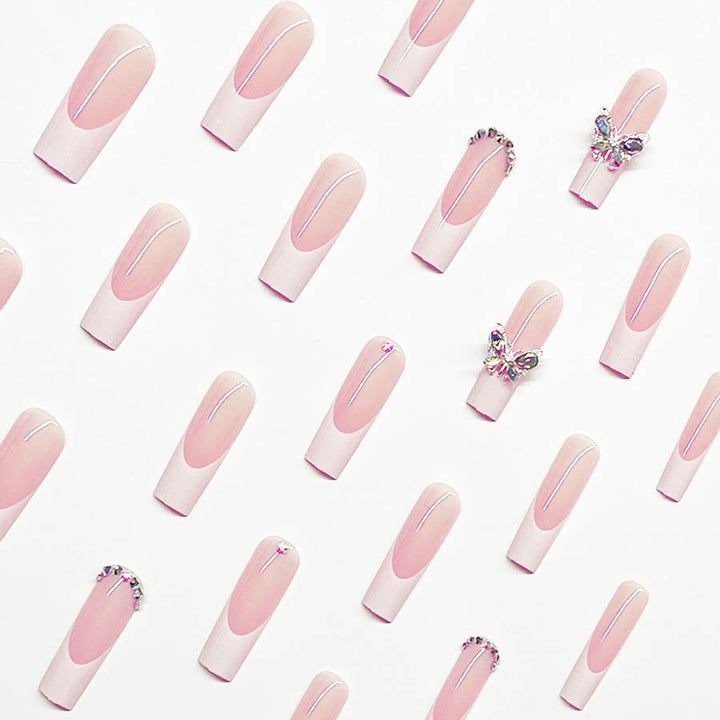 Acrylic nail set with elegant design and sparkling rhinestone accents Kalsten