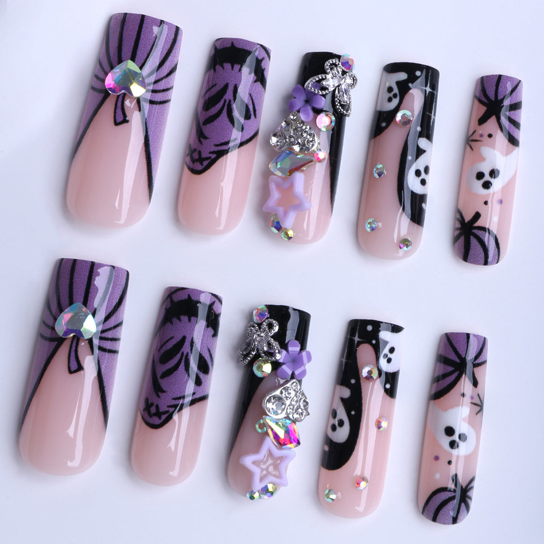 Artificail nails with creative Halloween design and glitter accents Kalsten