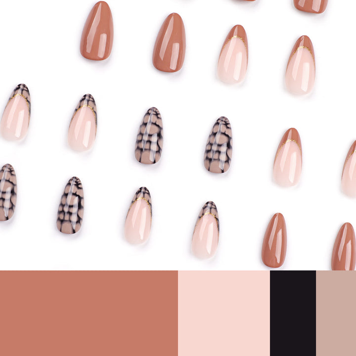 Artful stiletto nails with elegant gold decoration Kalsten