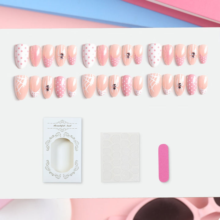Artificial nail set with playful spider and polka dot motifs Kalsten