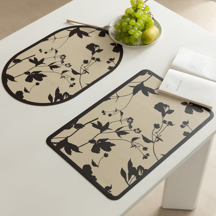 Wipeable table mats made of PU leather with botanical silhouette design Kalsten