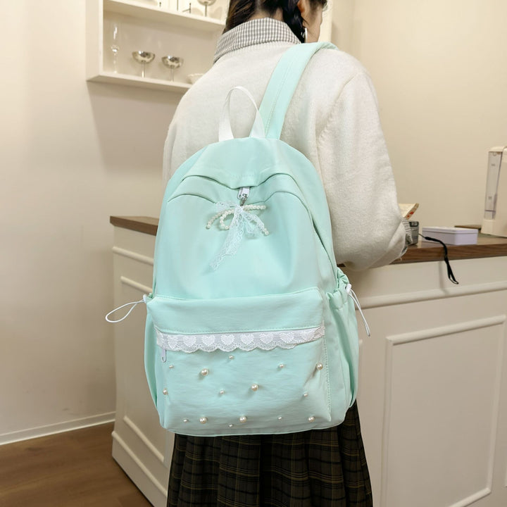 Backpack with elegant pearl applications and intricate design Kalsten