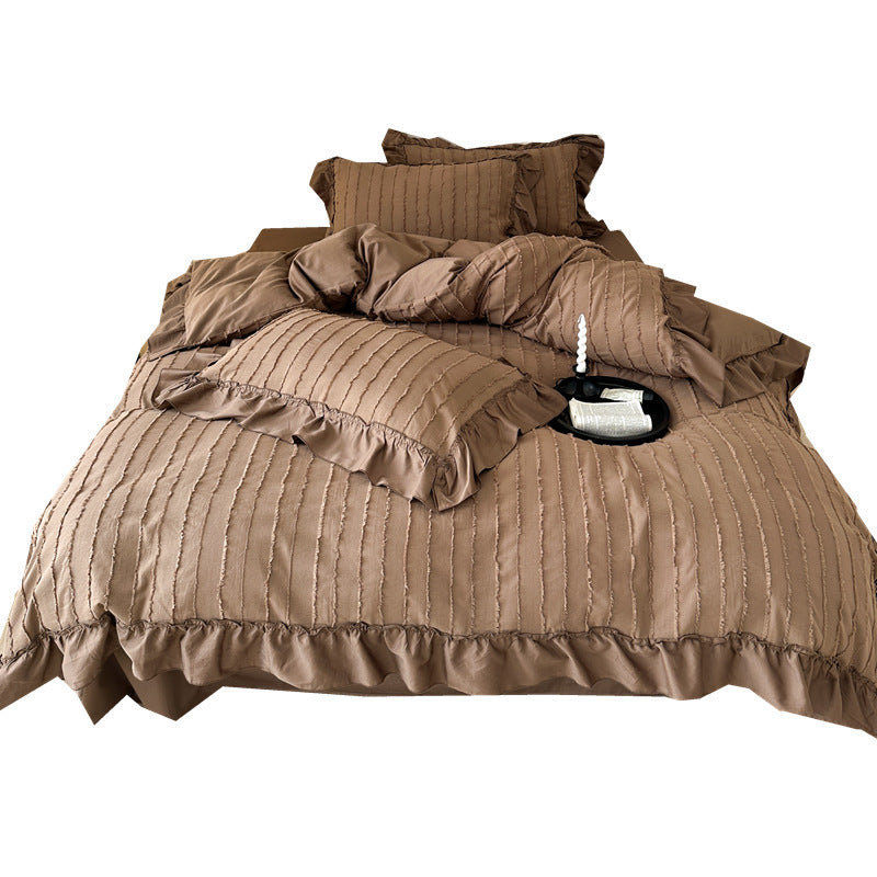 Bedding set with ruffles and ribbed stripe texture