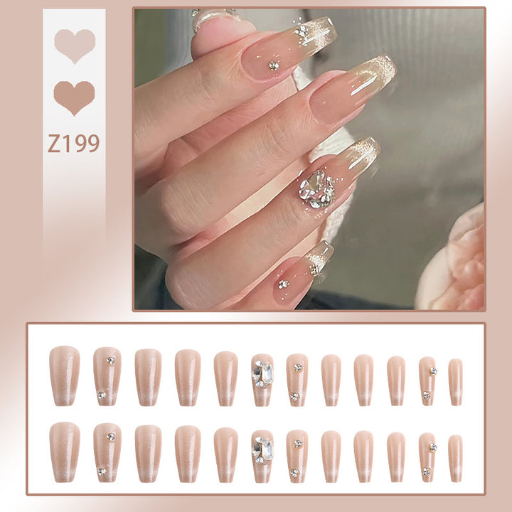 Acrylic nail set with glamorous glitter accents and elegant jewelry embellishments Kalsten