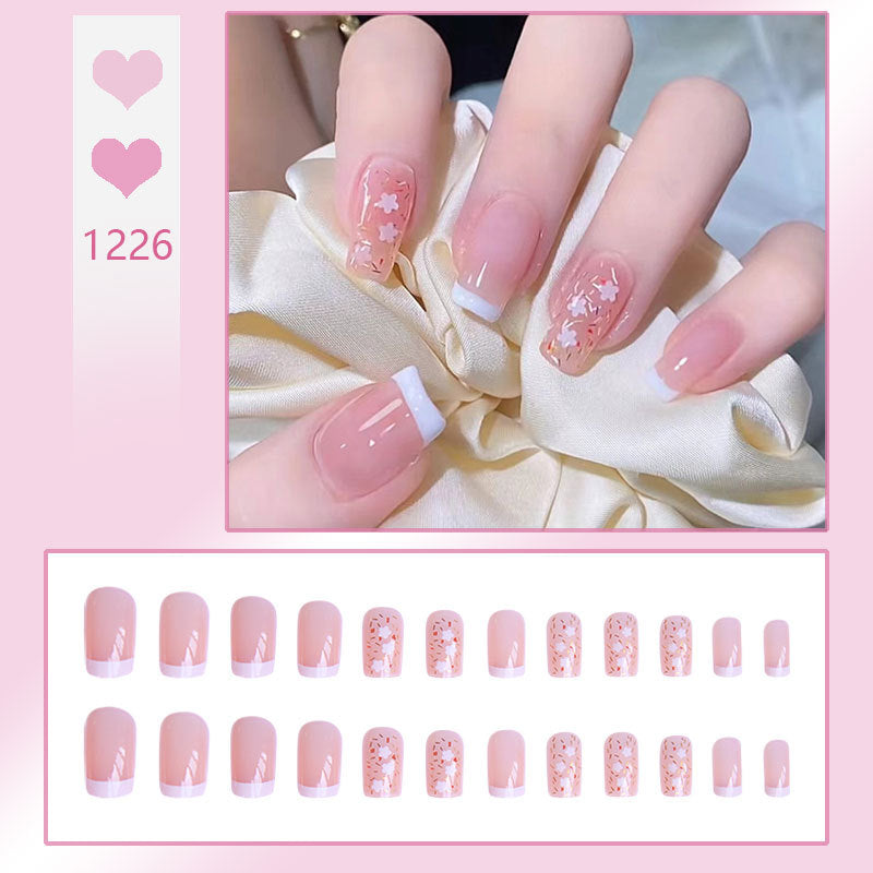 Nail art set with floral decorations and elegant French design Kalsten