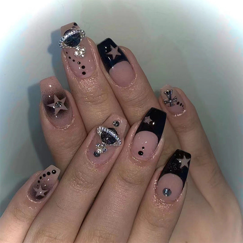 Glamorous nail art with star motifs and glitter accents Kalsten