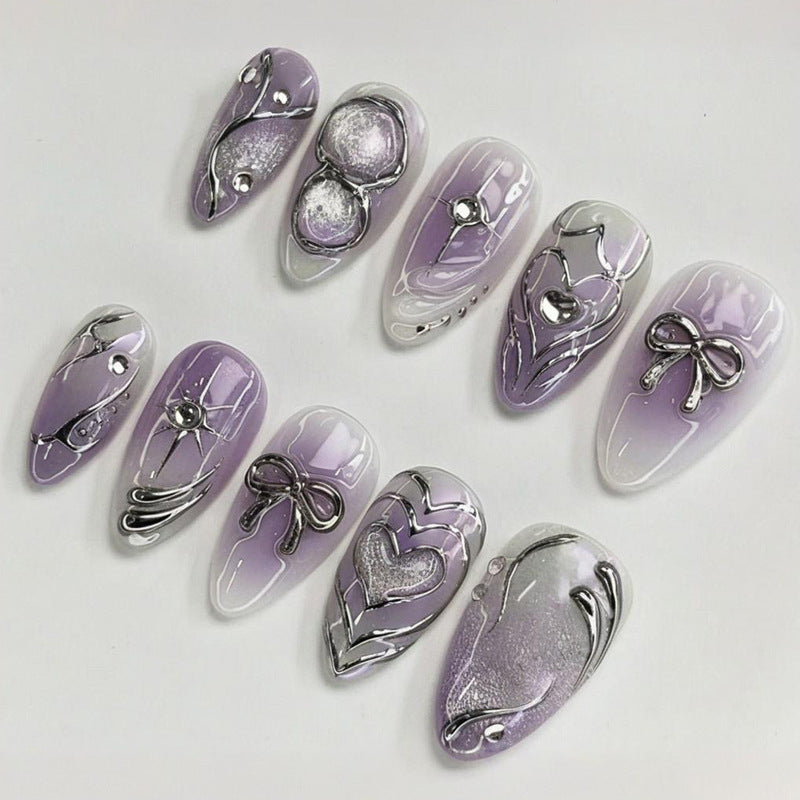 Nail art set with elegant flower and glitter accents Kalsten