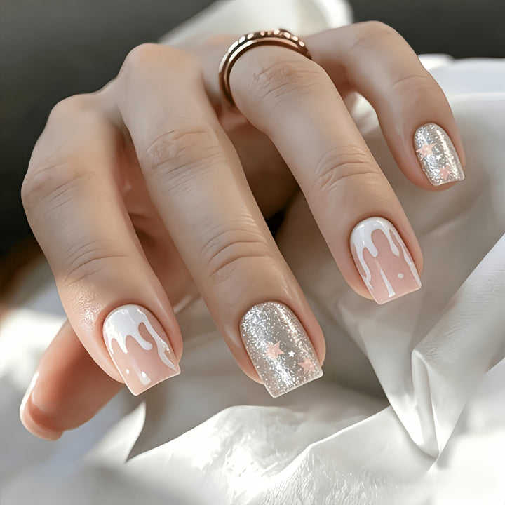 Glittering artificial nails with playful drop design Kalsten