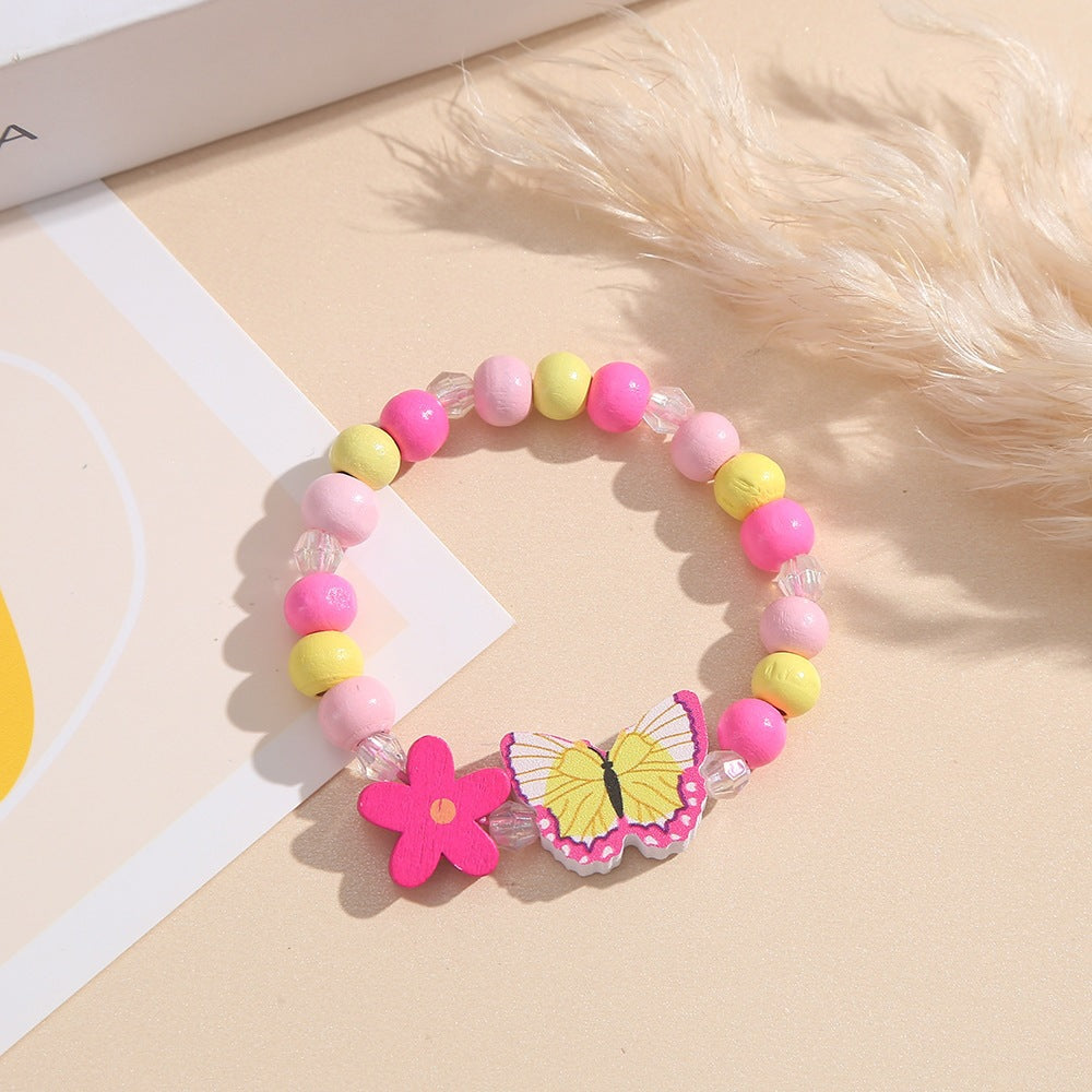 Playful bracelet with heart and butterfly charms Kalsten