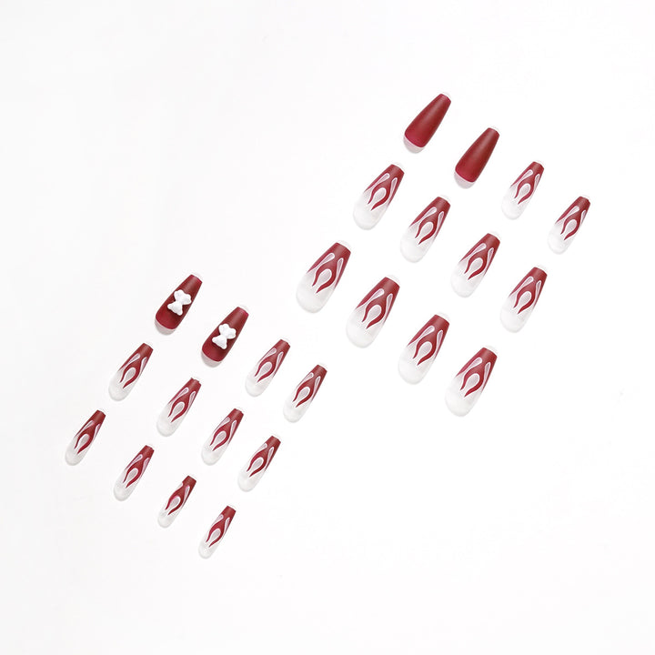 Artful stiletto nails with fiery flame design Kalsten
