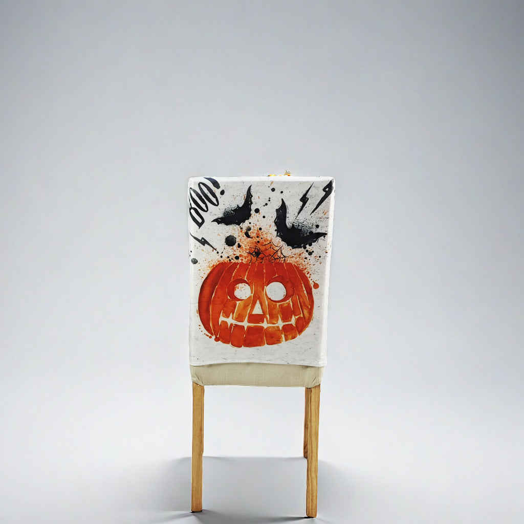 Stretch chair back cover with detailed pumpkin watercolor print and bat accents