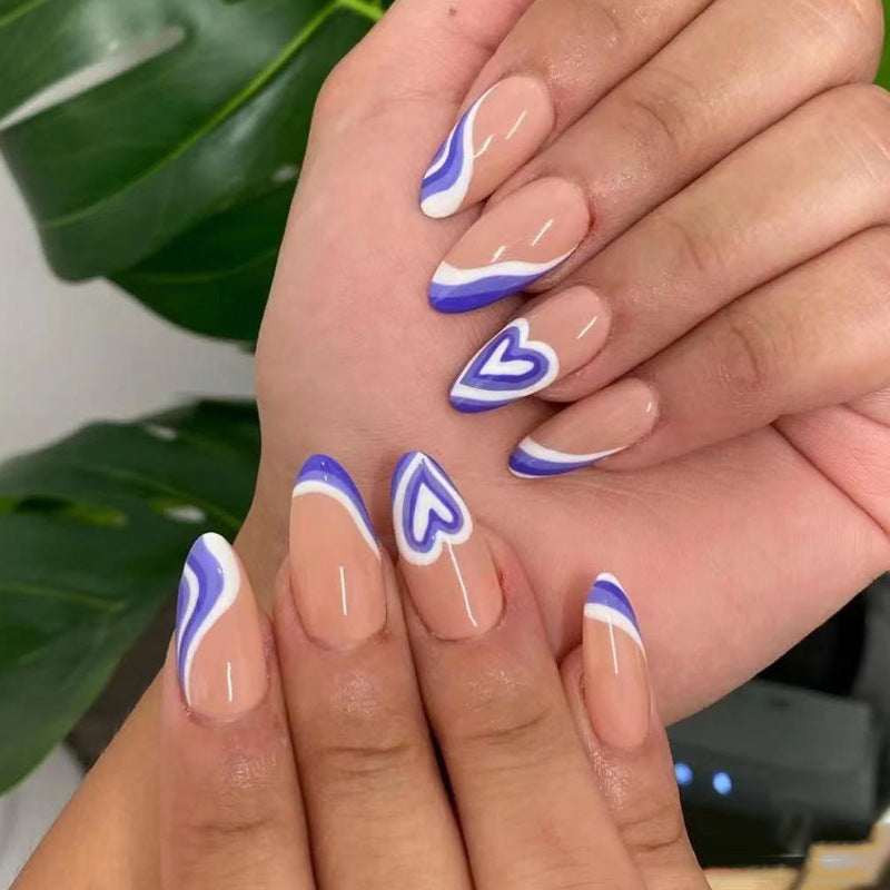 Artful nail extensions with an elegant leaf pattern Kalsten