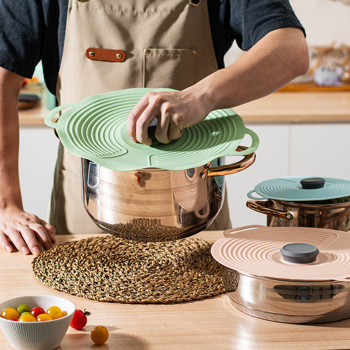 Silicone cooking lid with multifunctional steam valve Kalsten
