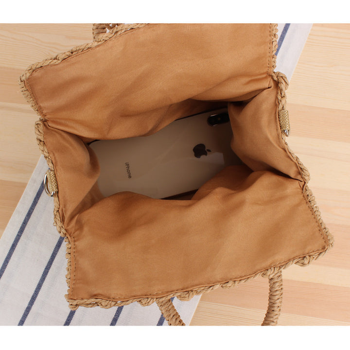 Handbag made of woven natural material with practical shoulder strap Kalsten