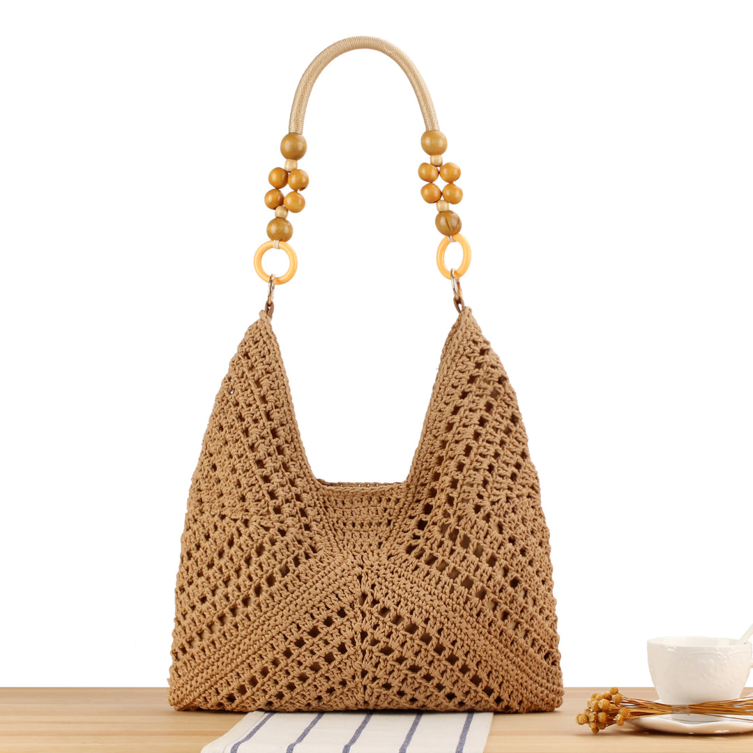 Handmade straw tote bag with elegant wooden handles Kalsten