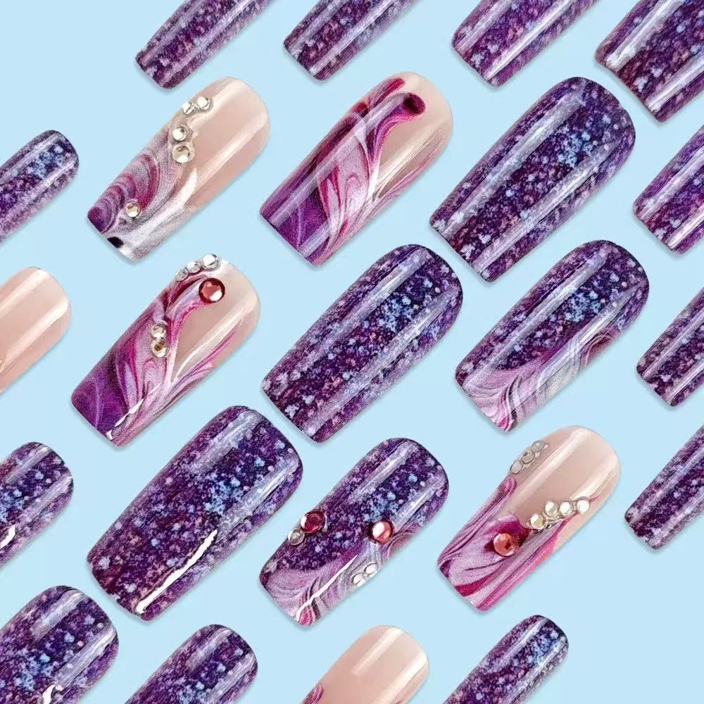 Acrylic nail set with luxurious color gradients and sparkling accents Kalsten