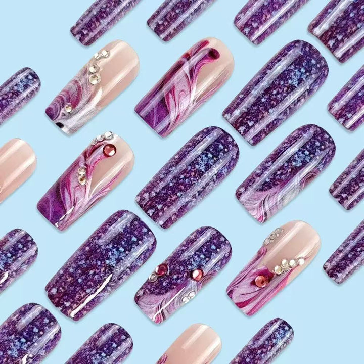 Acrylic nail set with luxurious color gradients and sparkling accents Kalsten