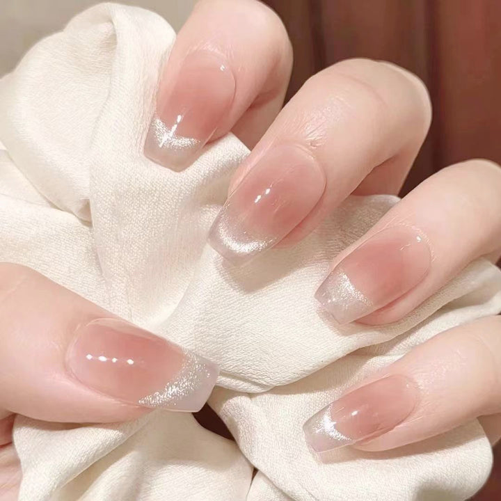 Nail set with elegant French design and sparkling accents Kalsten