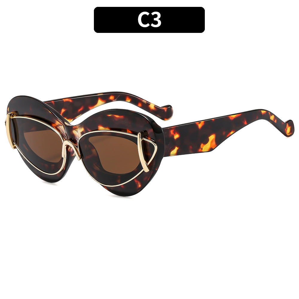 Retro-Inspired Cat-Eye Sunglasses with Unique Frame Details