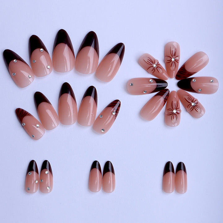 Artificial nails with elegant flower design and glitter accents Kalsten