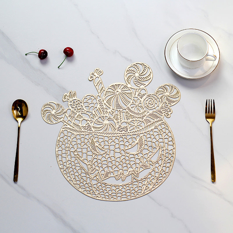 Filigree laser-cut pumpkin placemat made of wood for Halloween table decoration