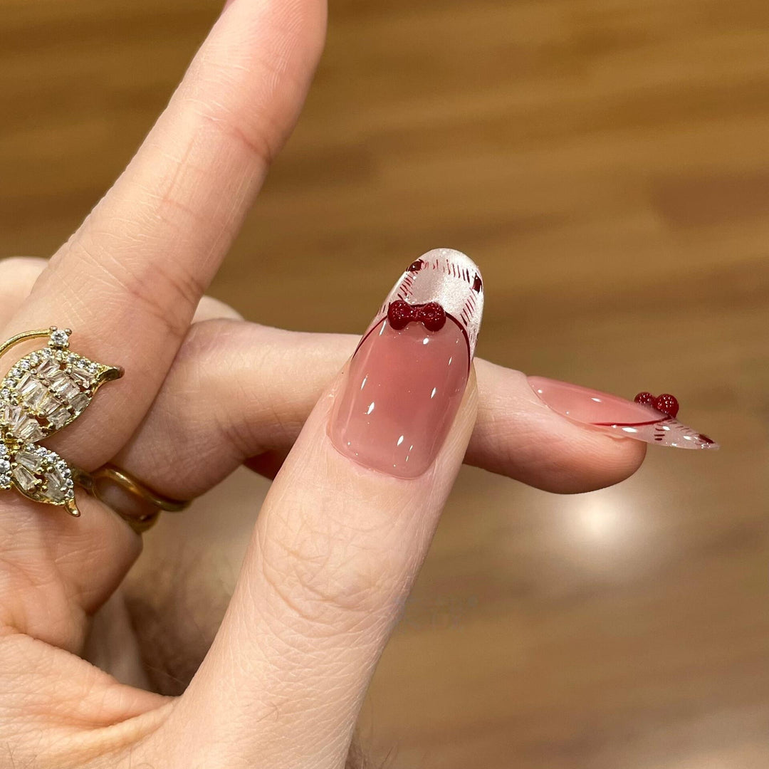 Artificial nails with playful Hello Kitty design Kalsten