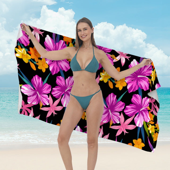 Beach towel with vibrant tropical plant motif Kalsten