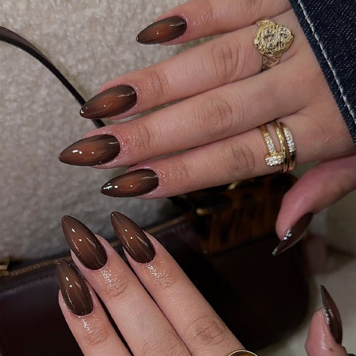 Acrylic nail set with luxurious color gradient and elegant lace accent Kalsten