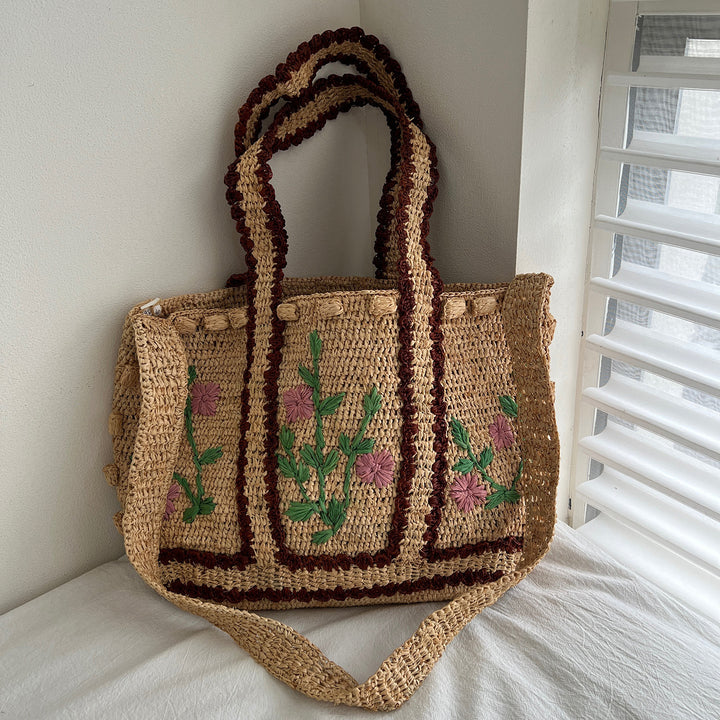 Braided shoulder bag with floral motif Kalsten