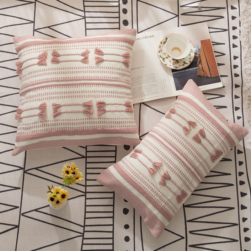 Woven decorative cushion cover with ordered tassel application and structured jacquard weaving Kalsten