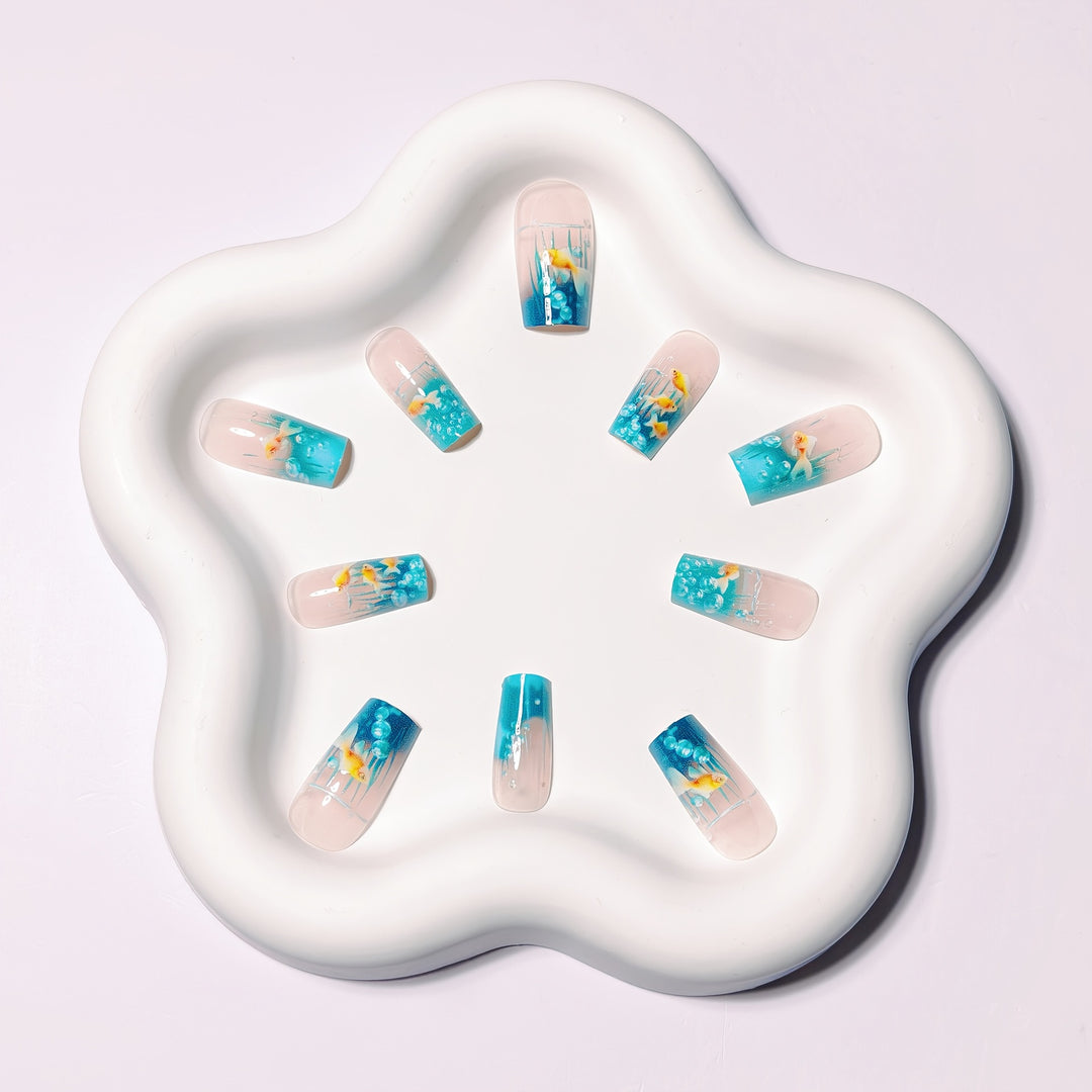 Creative art nails with maritime goldfish design Kalsten