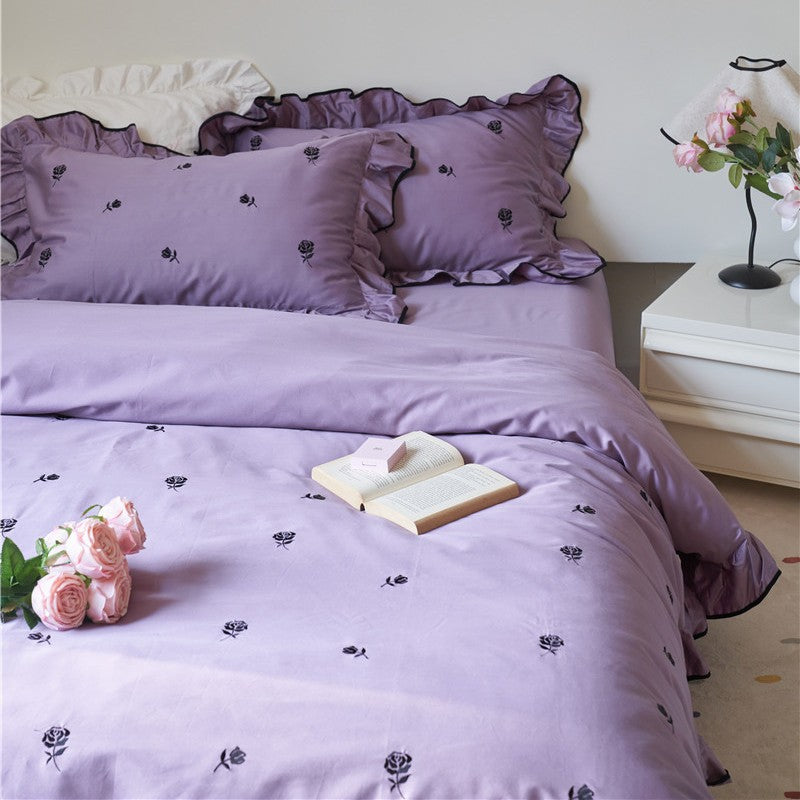 Bedding set with embroidered roses, ruffle details and extra soft cotton satin