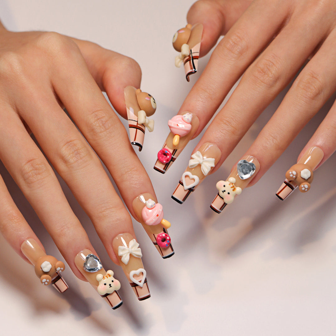 Artificial nail art with cute animal and candy motifs Kalsten