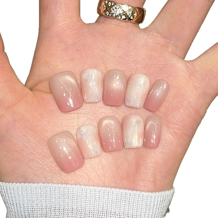 Artificial nails with elegant gradient colors and holographic accents Kalsten